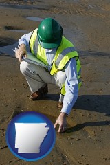 arkansas map icon and an environmental engineer wearing a green safety helmet