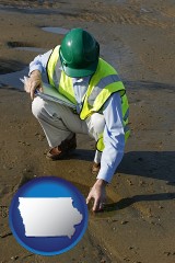an environmental engineer wearing a green safety helmet - with IA icon