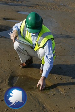 an environmental engineer wearing a green safety helmet - with Alaska icon