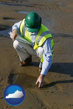 an environmental engineer wearing a green safety helmet - with Kentucky icon