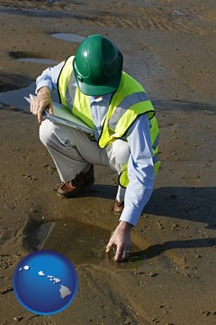 an environmental engineer wearing a green safety helmet - with Hawaii icon